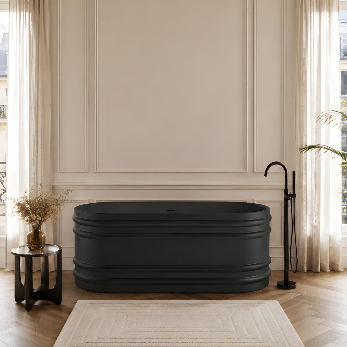 Baignoire îlot ovale 180 x 80 cm noir mat de style haussmannien installée dans une salle de bains